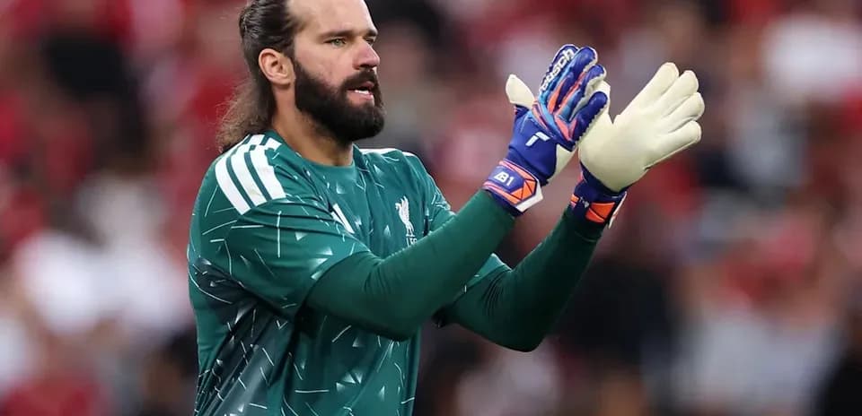 Goalkeeper warming up during football match