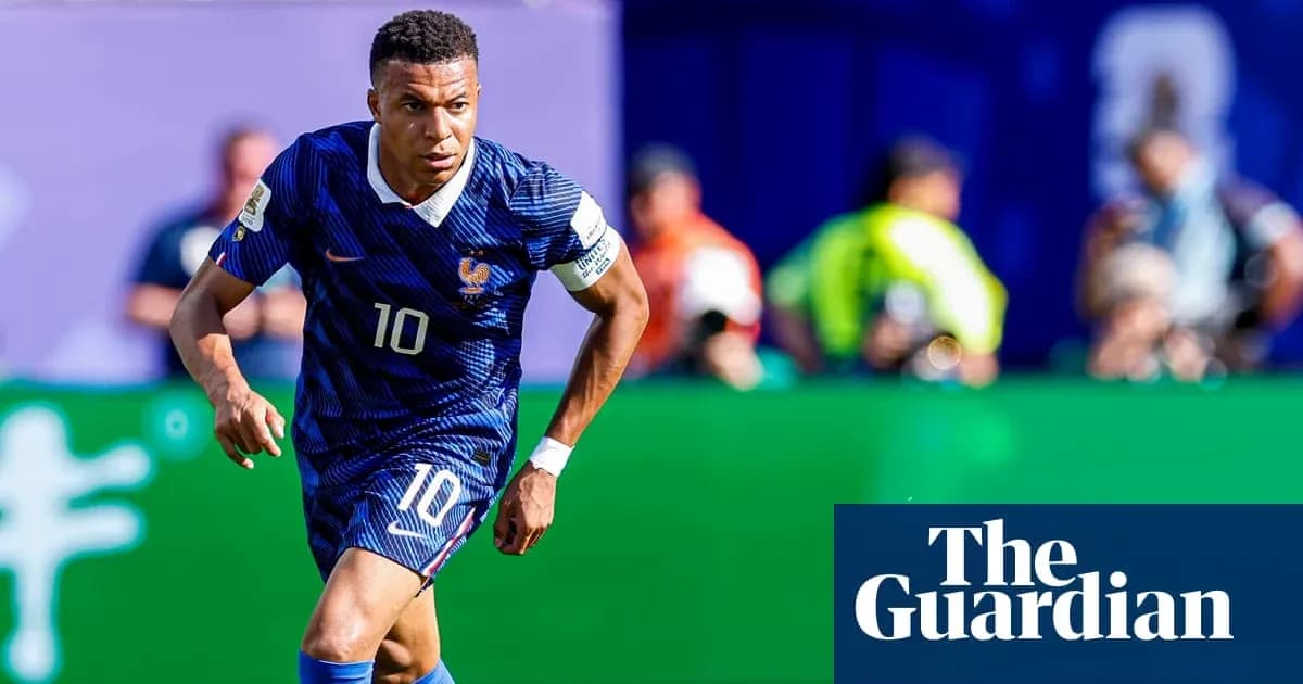 Kylian Mbappé dribbling during a football match