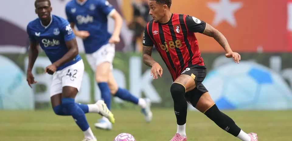 Bournemouth player dribbling the ball in match