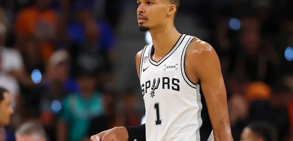 Spurs player on court during basketball game