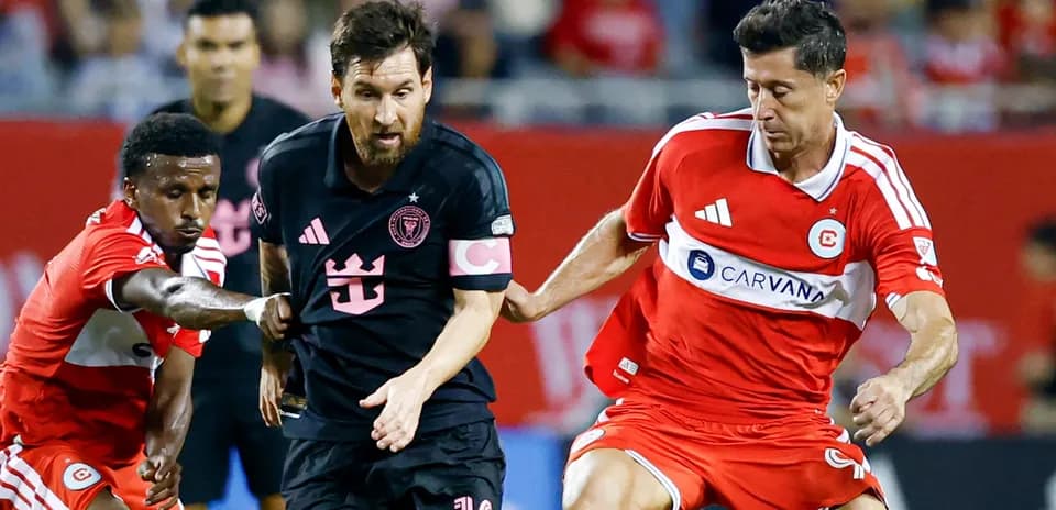Lionel Messi dribbling past defenders during match