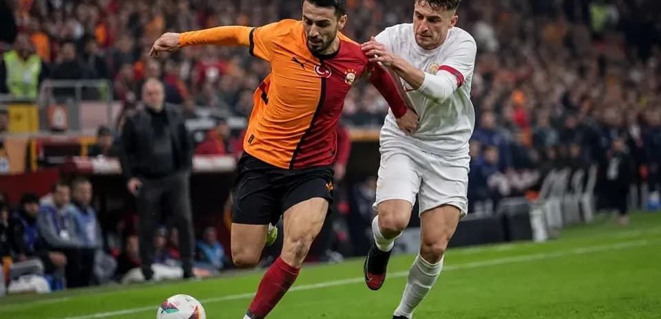 Player sprinting with ball while being challenged