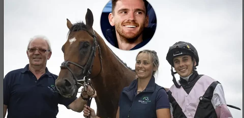 Jockeys and trainer posing with a horse