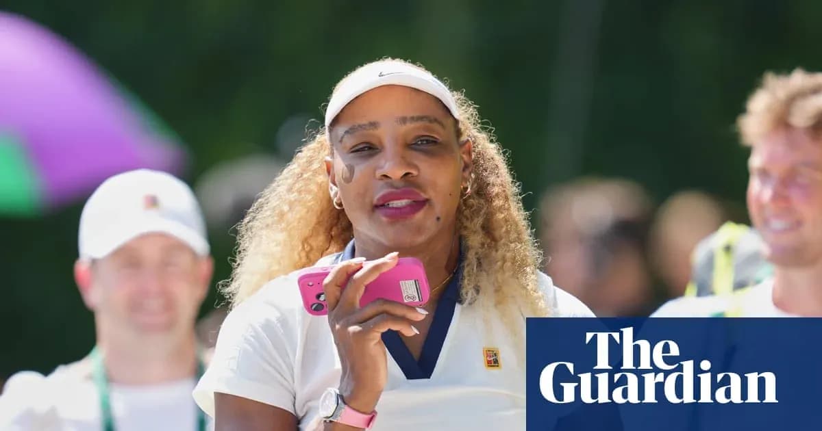 Tennis player holding a phone during event