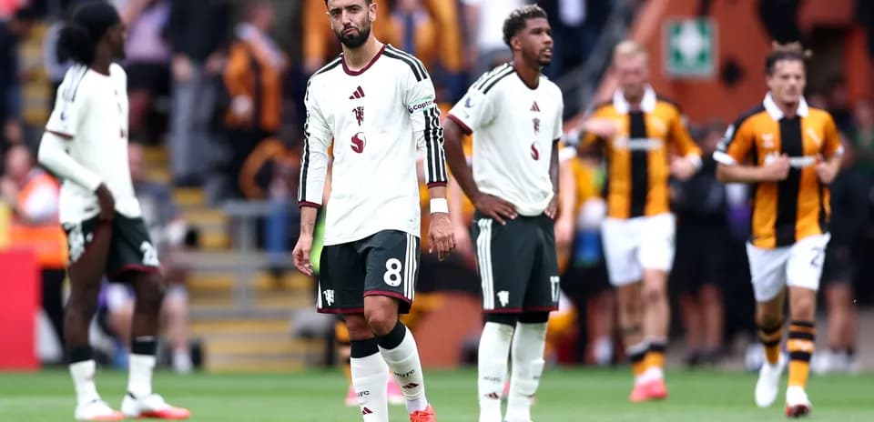 Swansea City players walking off after match defeat