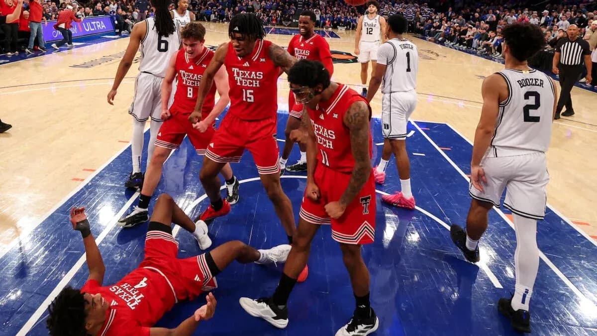 Texas Tech players celebrating on the court