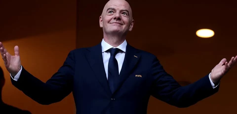 FIFA president gestures from VIP box at event