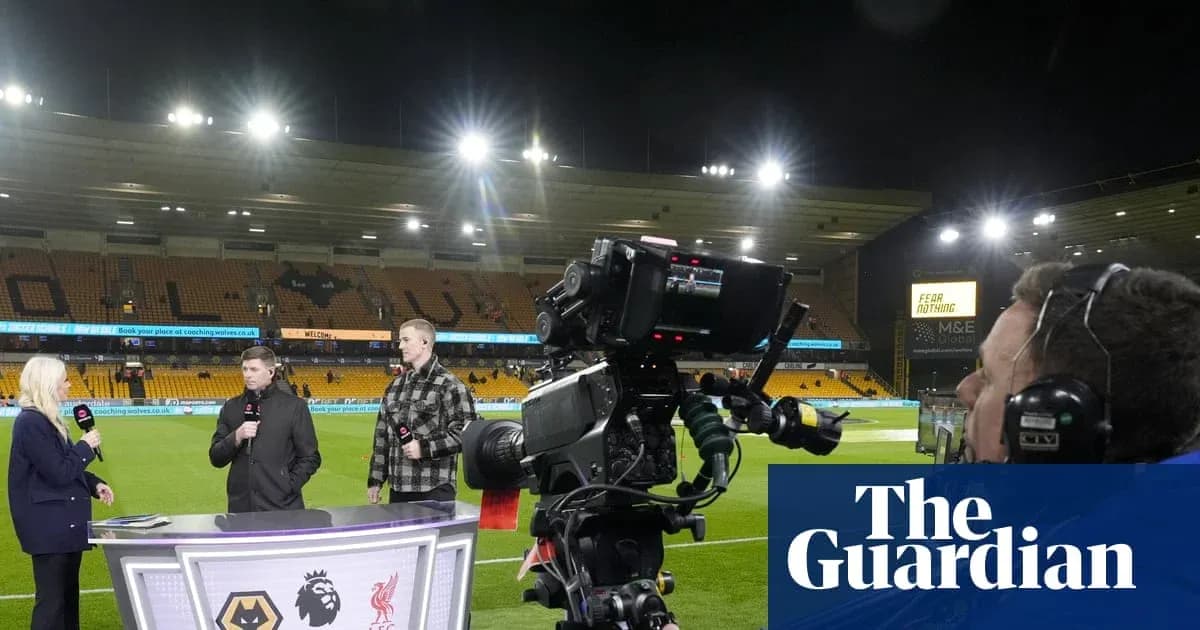 Television presenters discussing match at Molineux Stadium