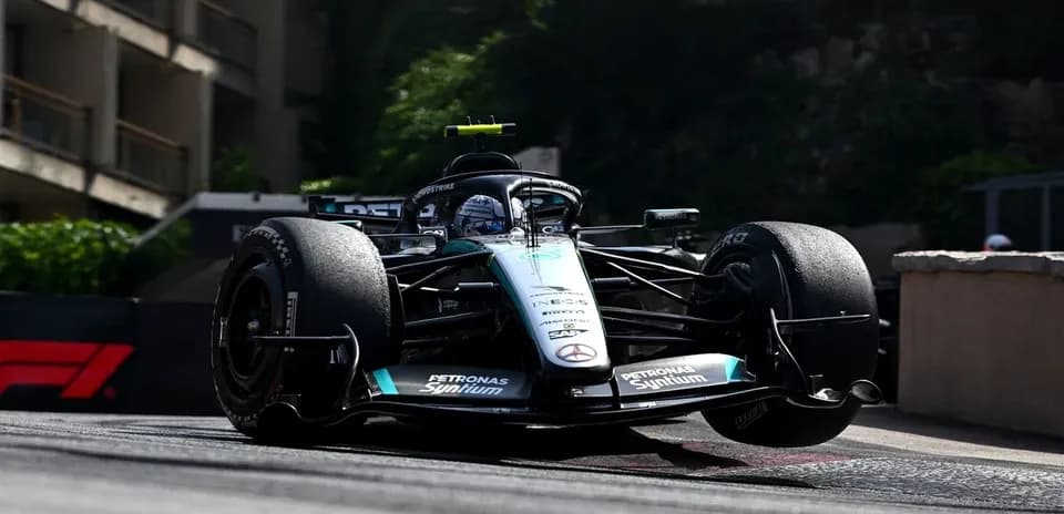 Formula 1 car racing on a street circuit