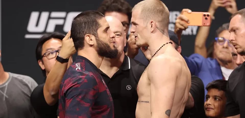 UFC fighters facing off during weigh-in event