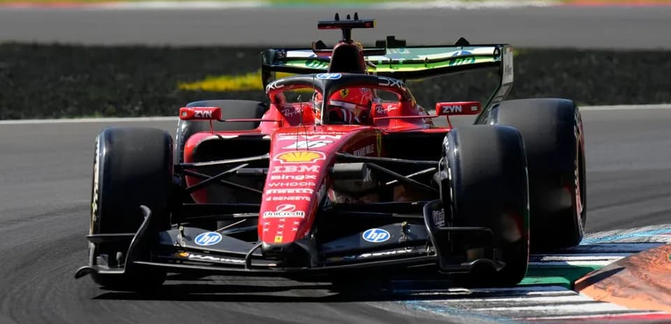 Ferrari Formula 1 car navigating a track corner