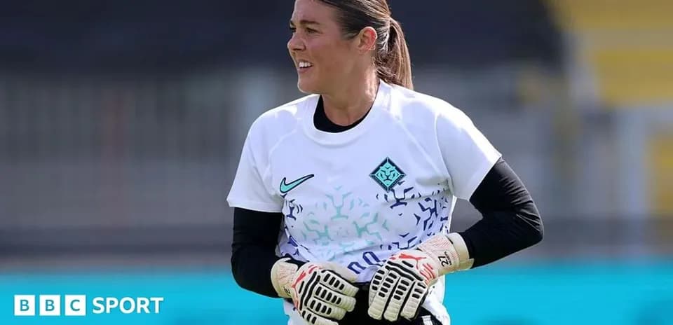 Goalkeeper training on the pitch before the match