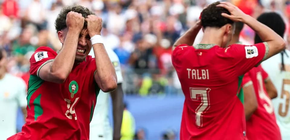 Moroccan players react after missed opportunity in match