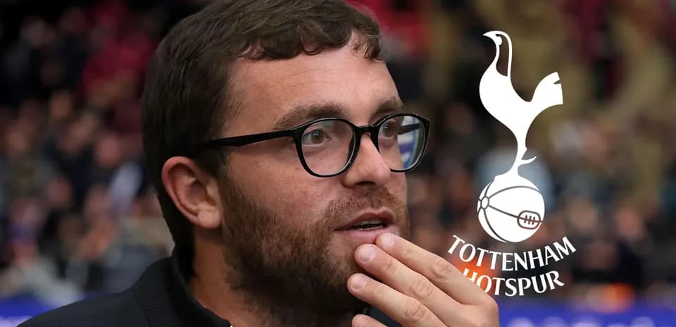 Tottenham Hotspur official watching a match