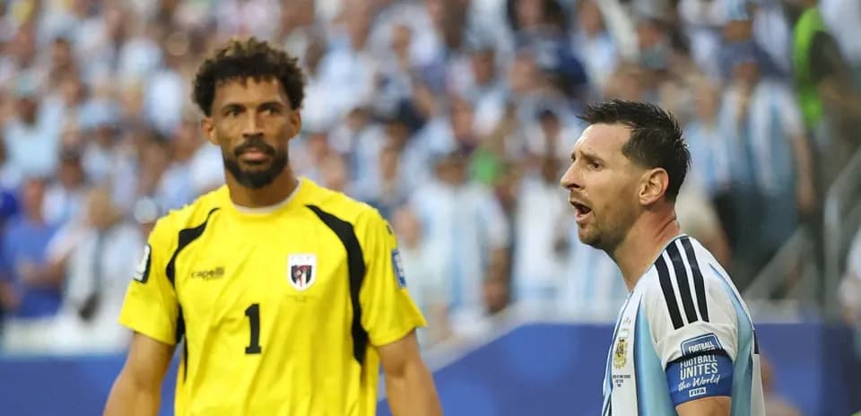 Lionel Messi and goalkeeper during football match