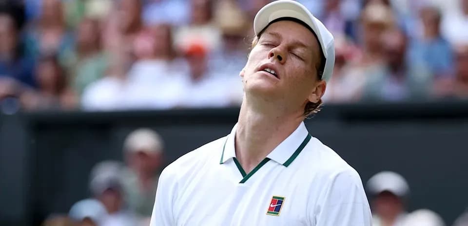 Tennis player looking frustrated during match