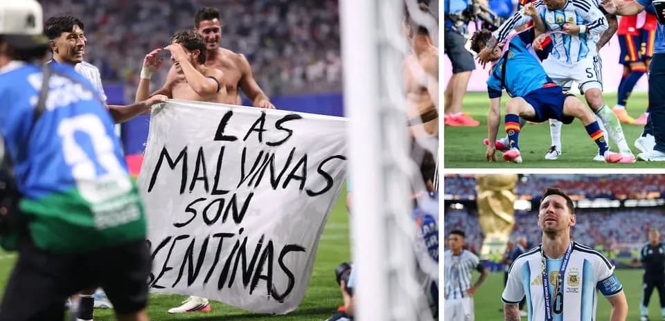 Argentina players celebrating with banner after match