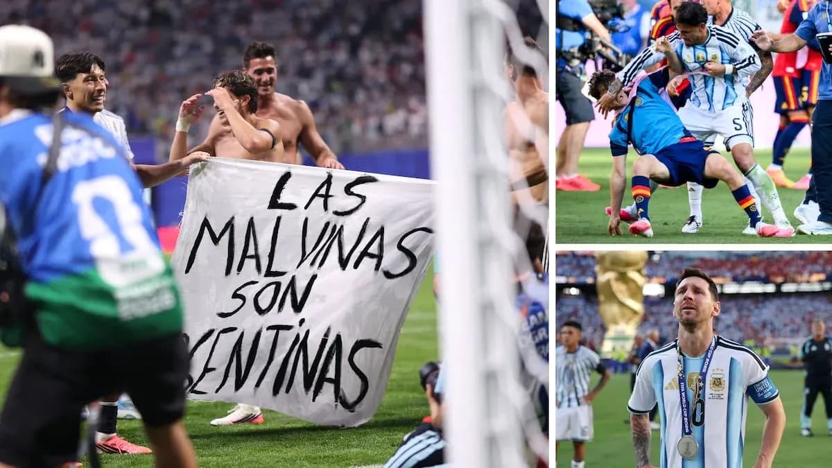 Argentina players celebrating with banner after match