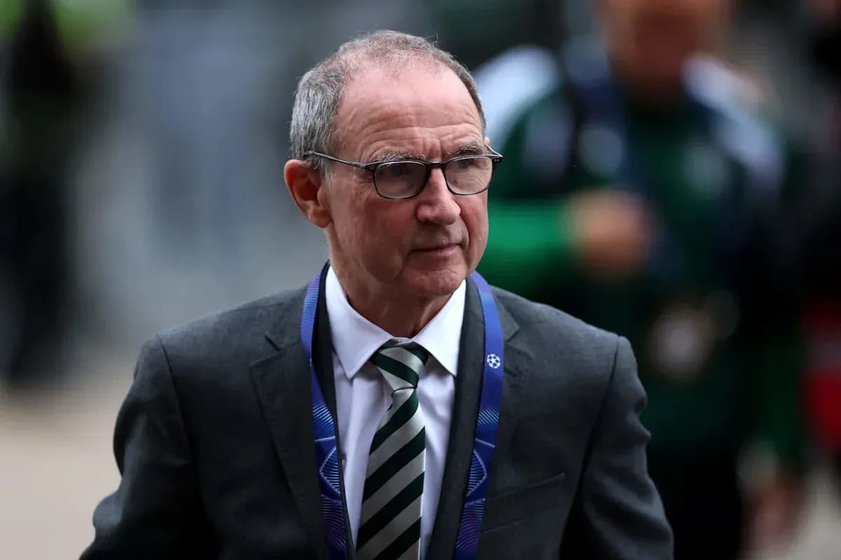 Men's football manager arriving at a stadium