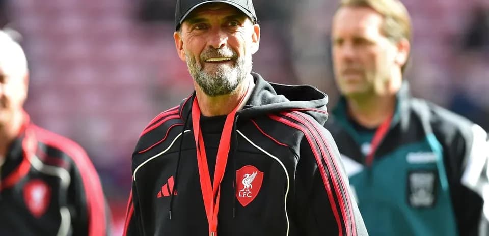 Liverpool FC manager on the pitch during training