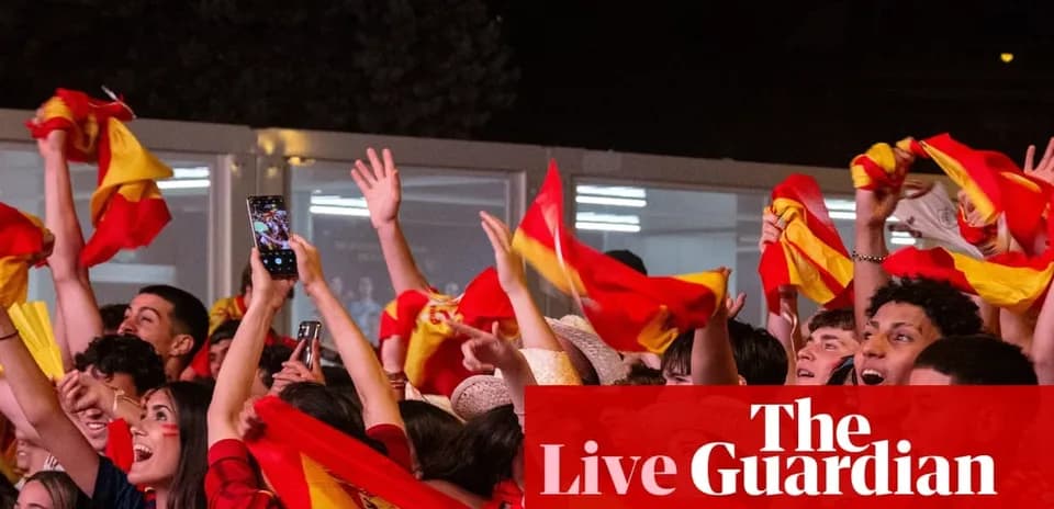 Fans celebrating with flags at outdoor event