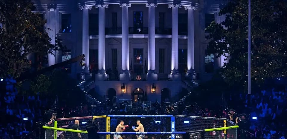 Two fighters competing in octagon near White House