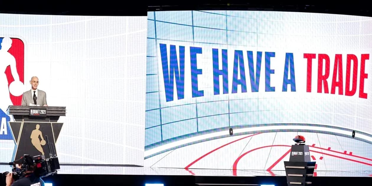 NBA commissioner announcing trade during draft event