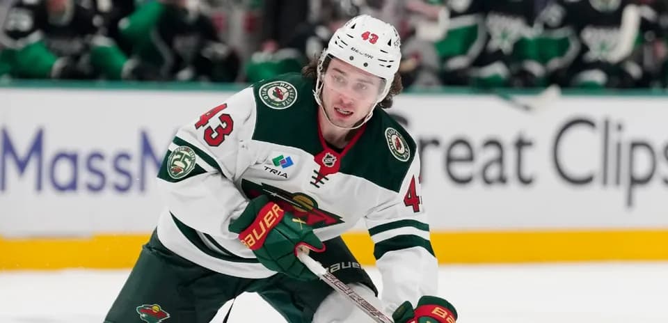 Hockey player skating on ice during game