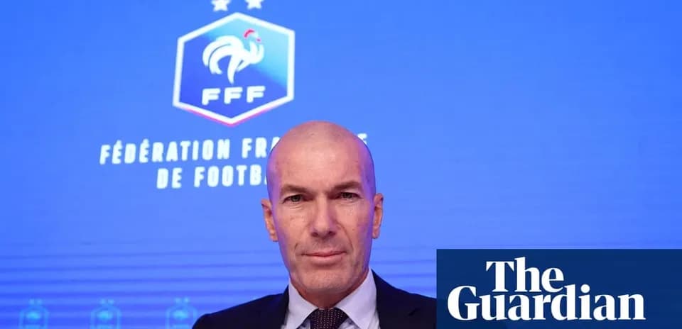 Men's football manager at press conference backdrop
