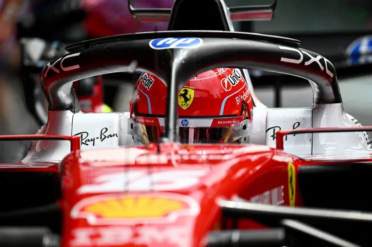 F1 driver in Ferrari car during pit stop