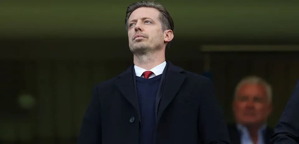 Man observing from the stands during a match