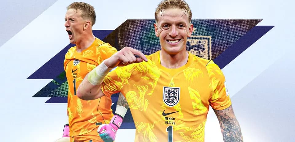Goalkeeper in yellow kit celebrating and posing