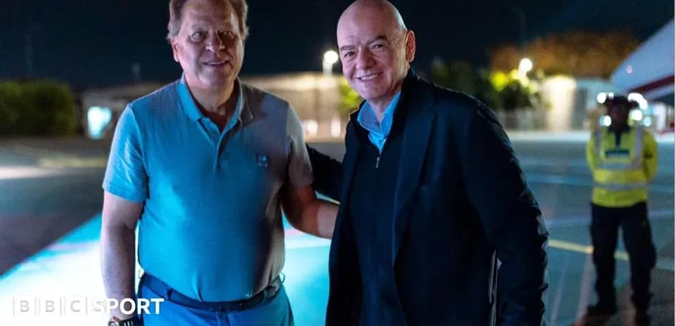 Two men posing together at airport at night