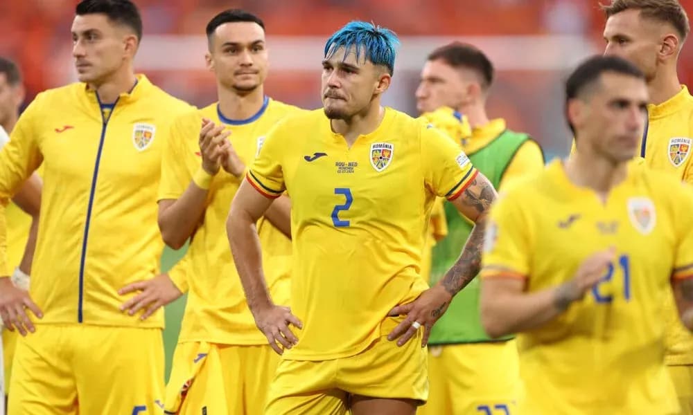 Romania players in yellow jerseys after match