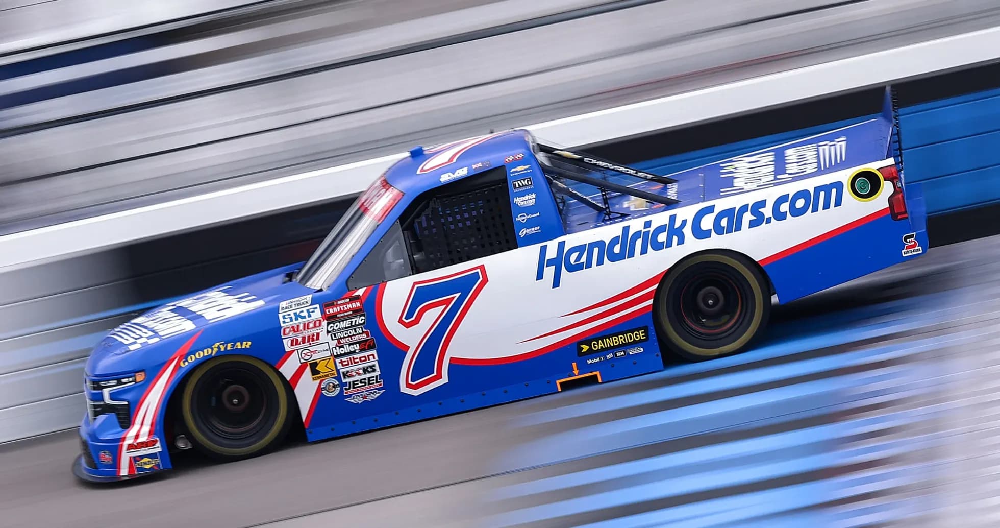 NASCAR truck racing on the track