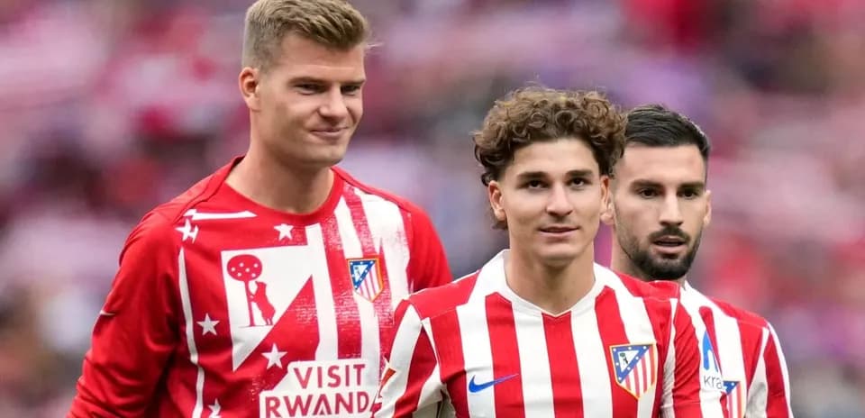 Atletico Madrid players walking on the pitch