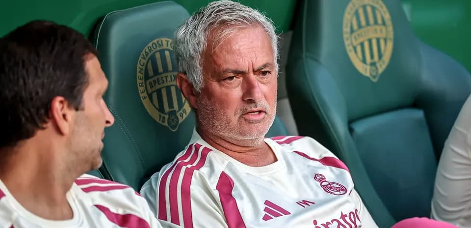 Jose Mourinho seated on the bench during match