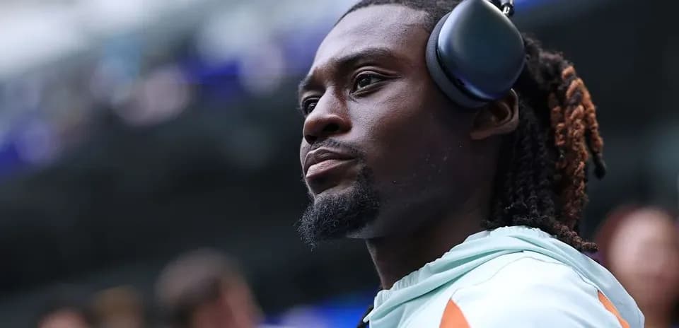 Athlete wearing headphones before the game