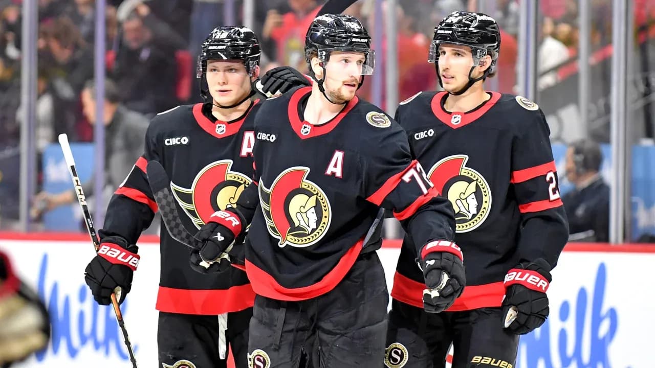 Ottawa Senators players celebrating a play on ice