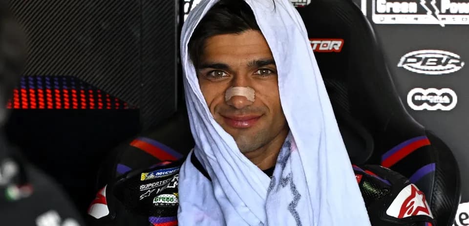 Rider with a towel on head and bandage on nose