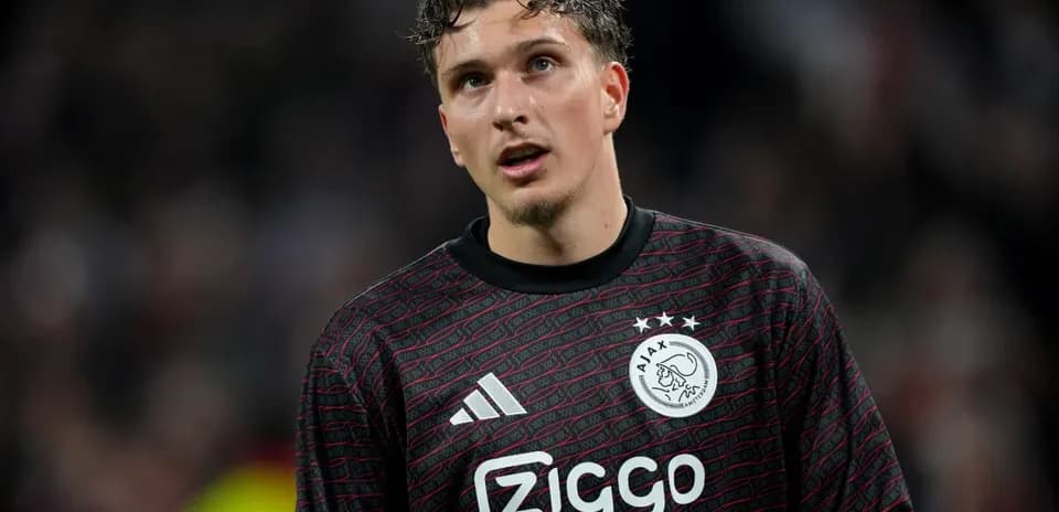 Goalkeeper in Ajax kit during match