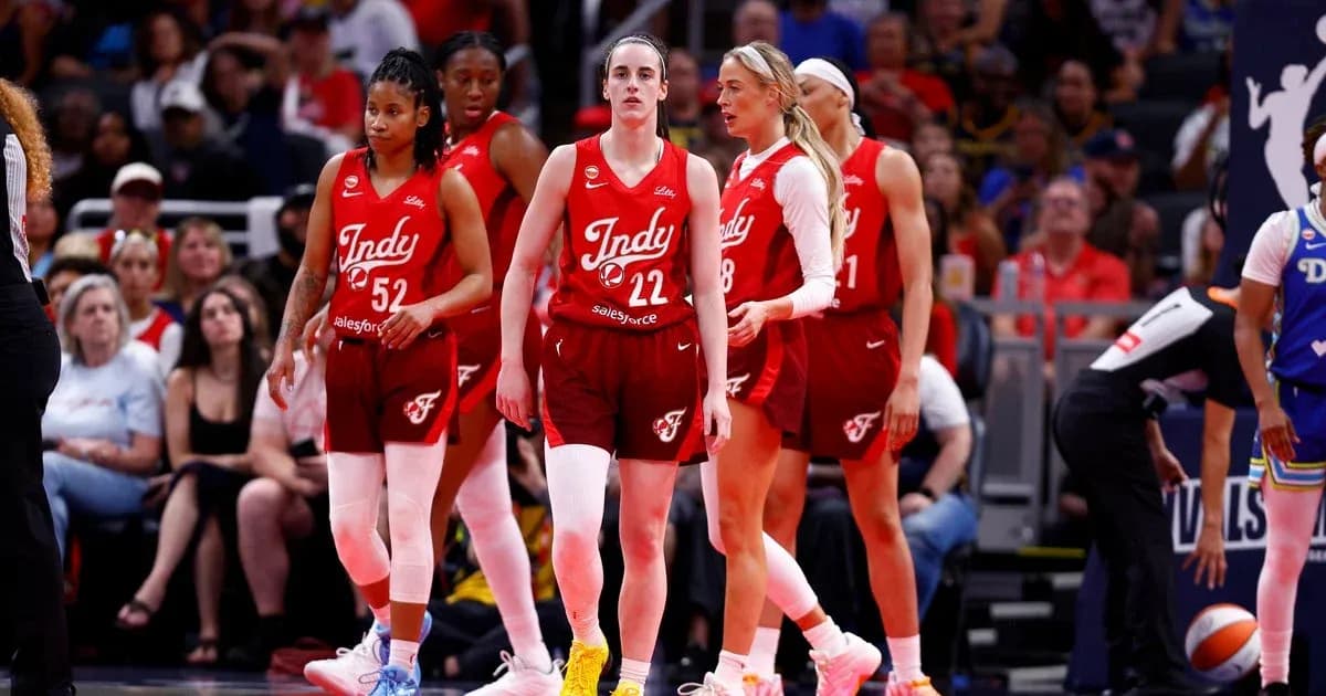 Indy team players walking on the court during game