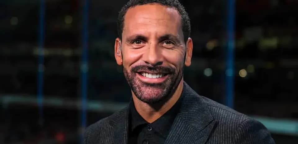 Analyst smiling in broadcasting studio