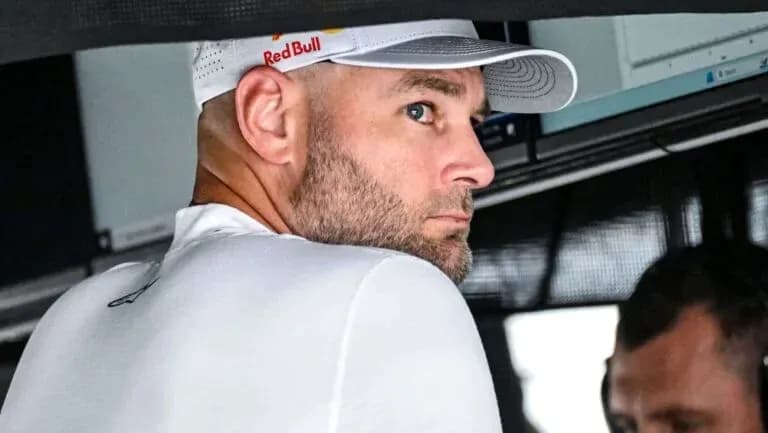Team member observing data on screen in garage