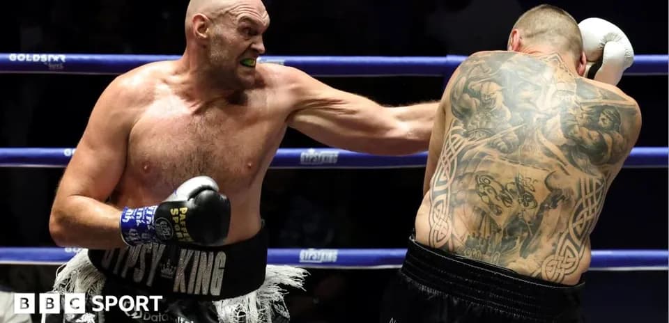 Boxer throwing a punch during a match