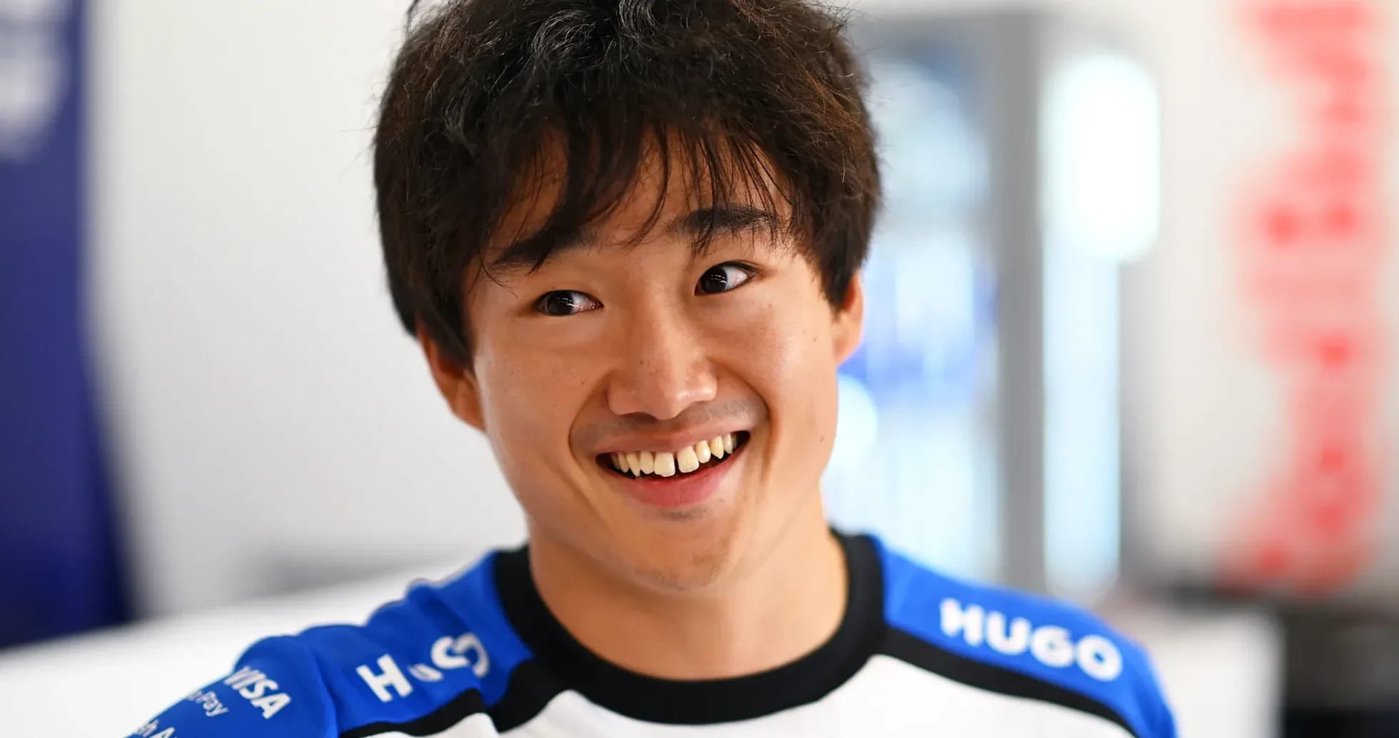 Yoshiharu Matsushita smiling in team uniform
