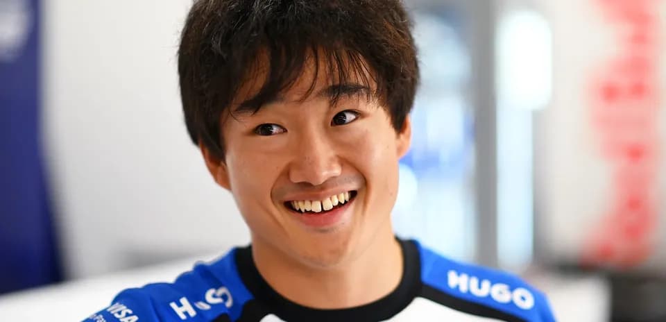 Yoshiharu Matsushita smiling in team uniform