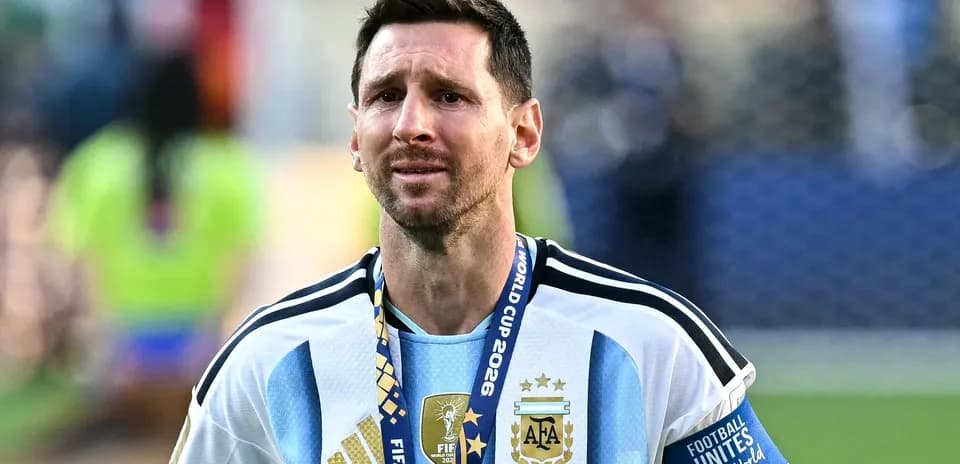 Lionel Messi wearing Argentina jersey with medal