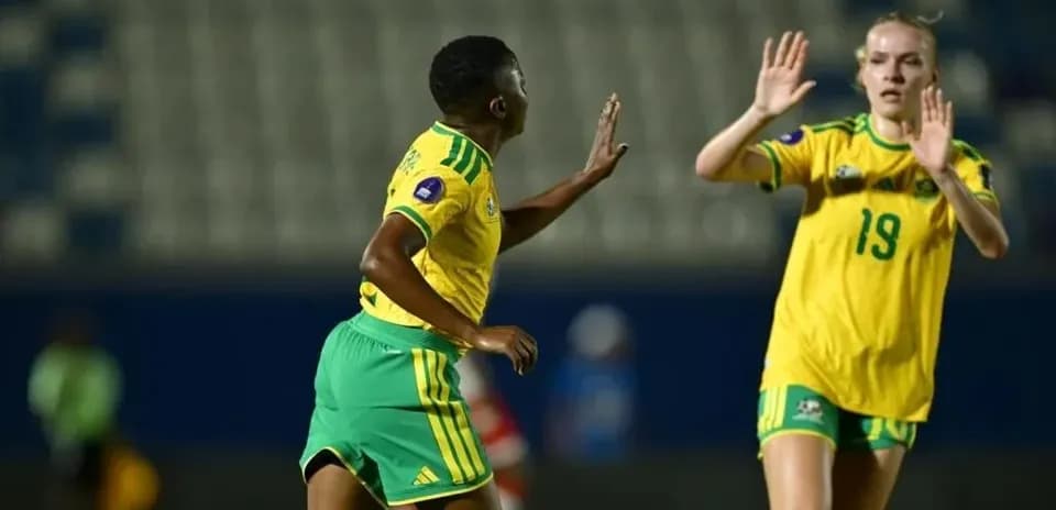 Two players interacting during a soccer match