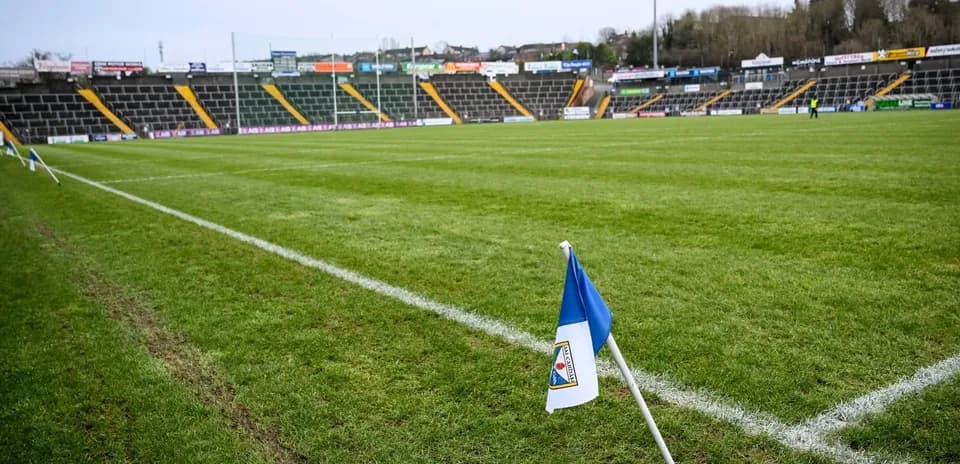 Corner flag on a grass football pitch